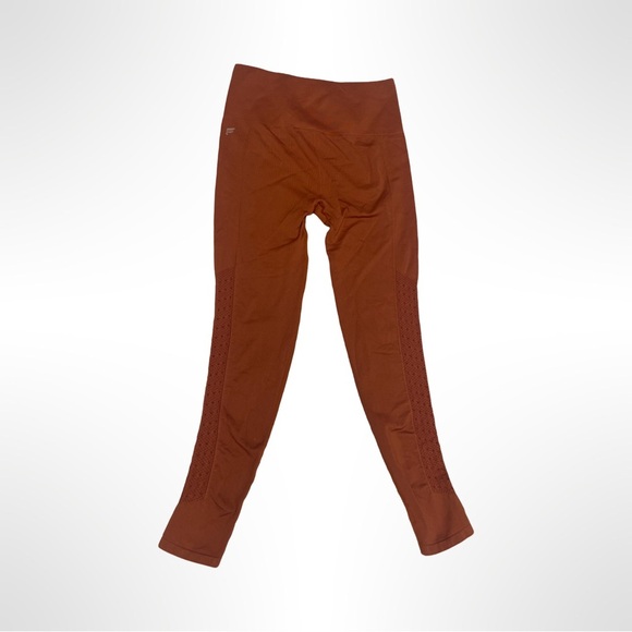 Fabletics perforated‎ burnt orange/rust colored leggings size sx - Picture 3 of 5